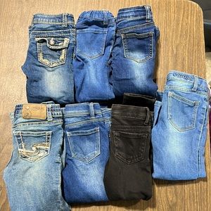 7 pairs of girls 4t jeans.